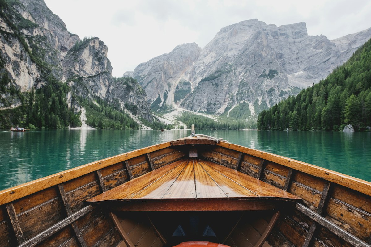 Calm lake and mountains on a travel route